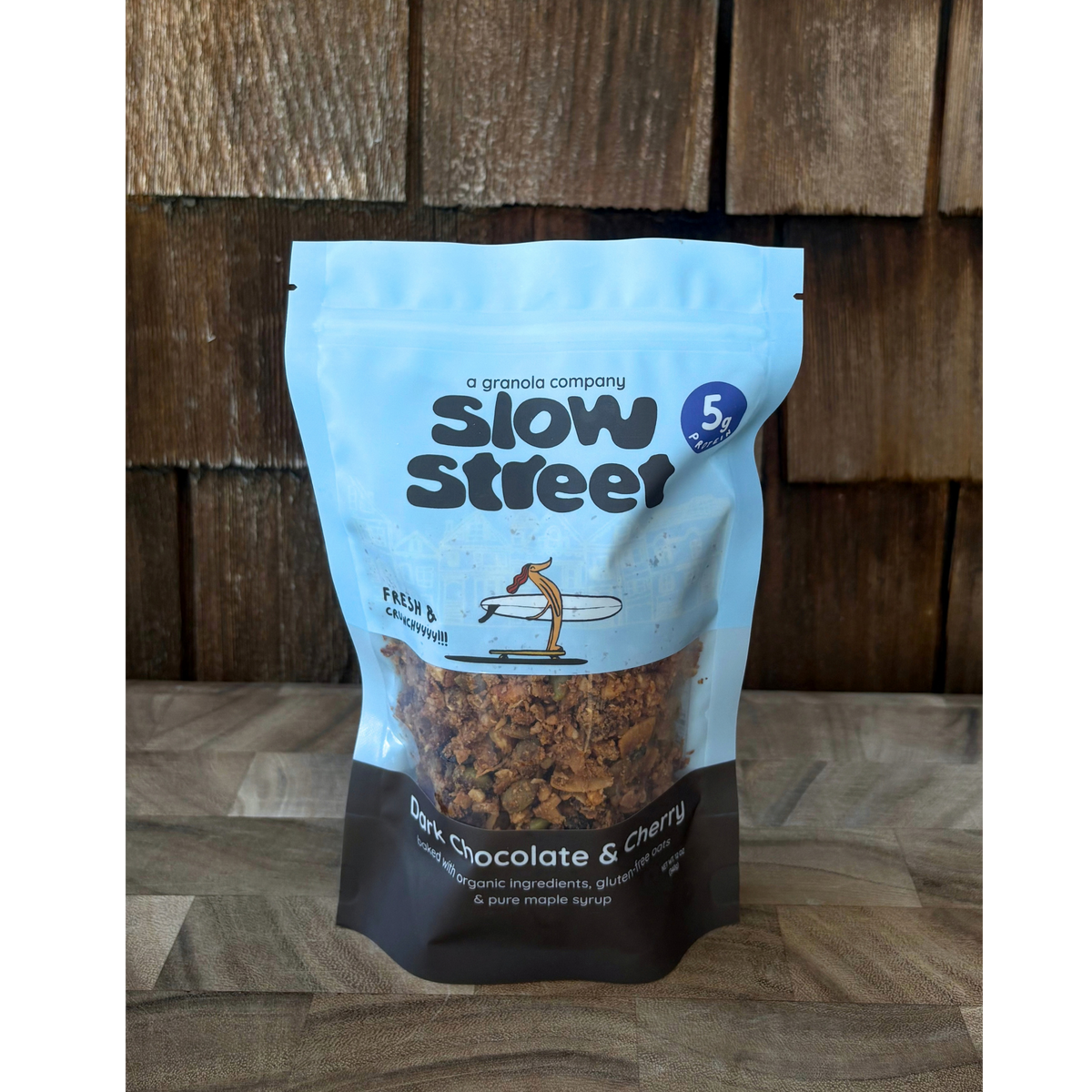 Slow Street Dark Chocolate and Cherry granola, 1 12 oz (340 g) bag, facing front.