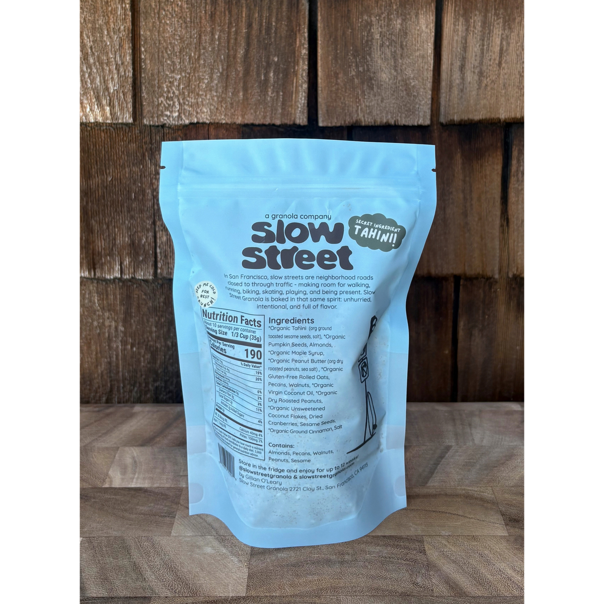 Slow Street peanut butter granola, 1 12 oz (340 g) bag, one showing its back.