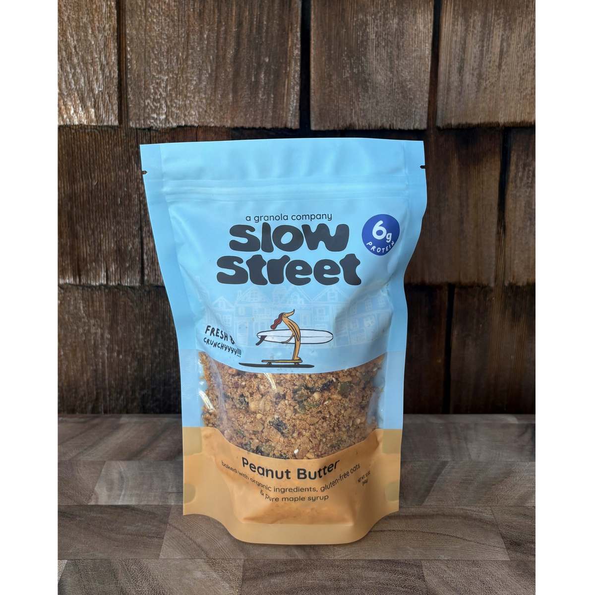 Slow Street peanut butter granola, 1 12 oz (340 g) bag, all facing front.